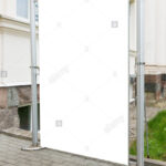 Signboard Stand Mock Up. White Banner Template In The Street For Street Banner Template