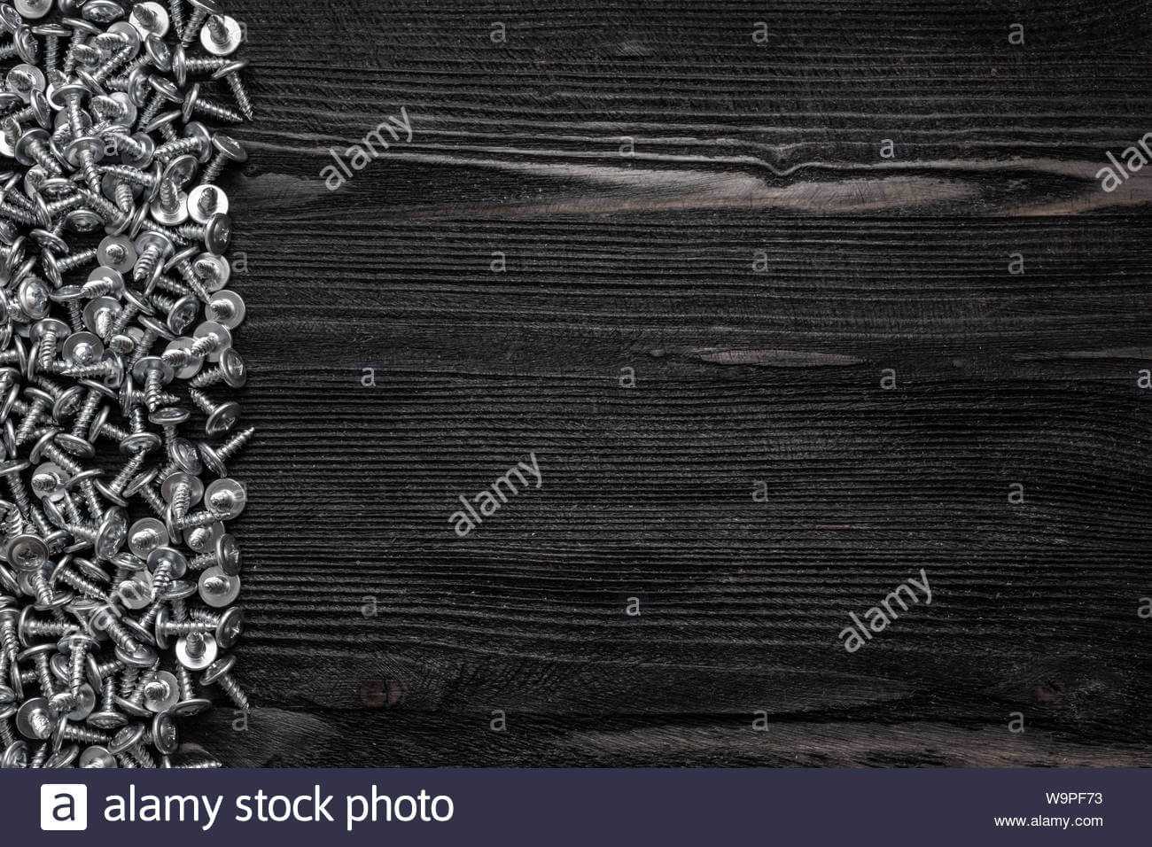 Some Wood Crews On Dark Wooden Desk Board Surface. Top View Pertaining To Borderless Certificate Templates